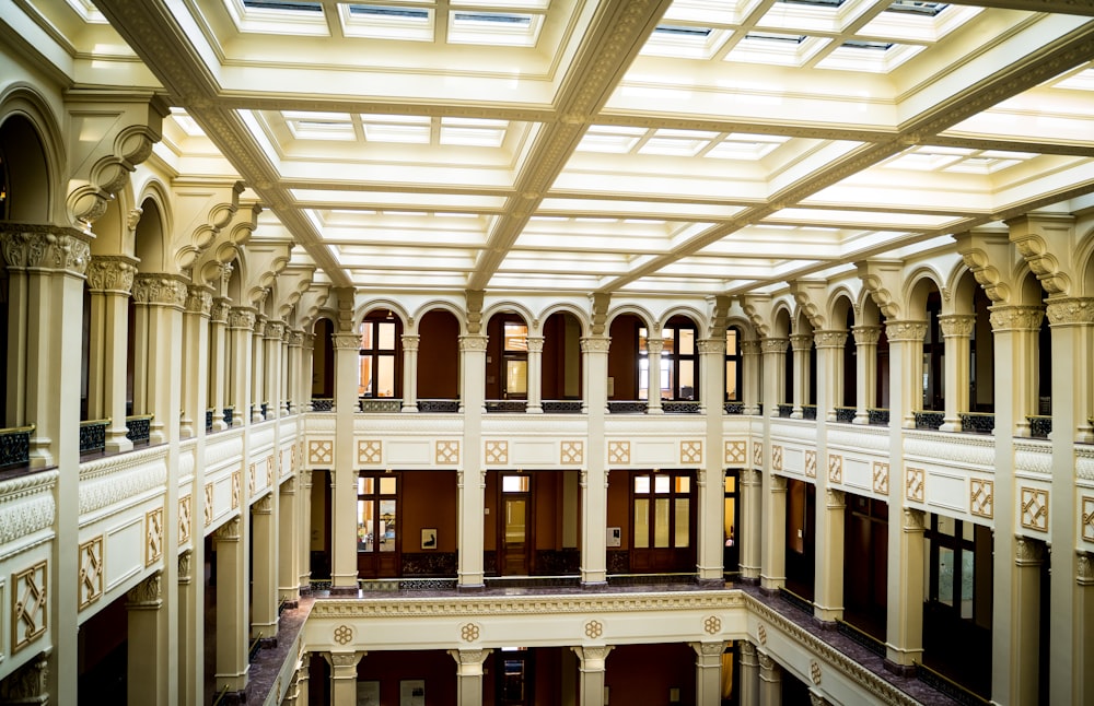 concrete building with light piercing from glass ceiling