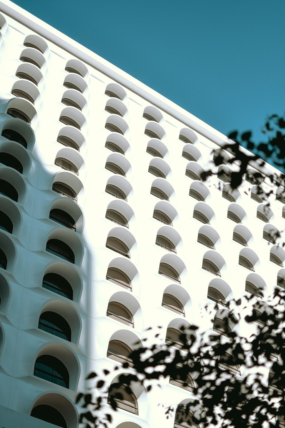 white concrete multi-story building during daytime