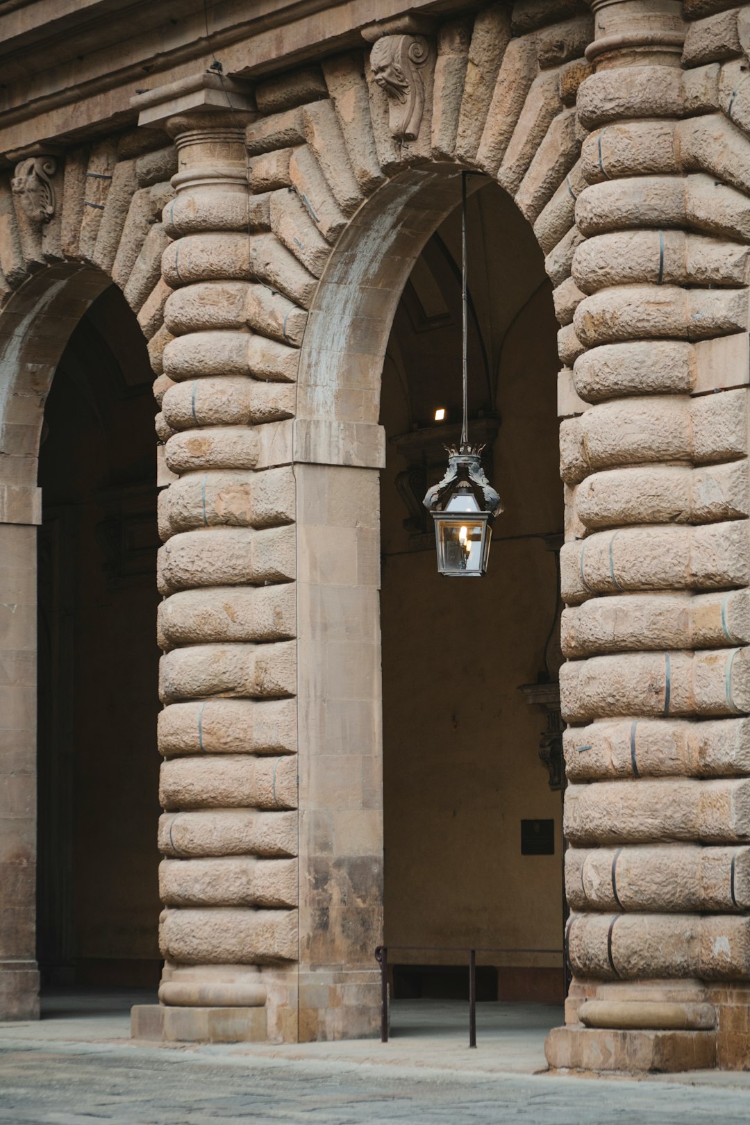 pendant lamp over arch entryway