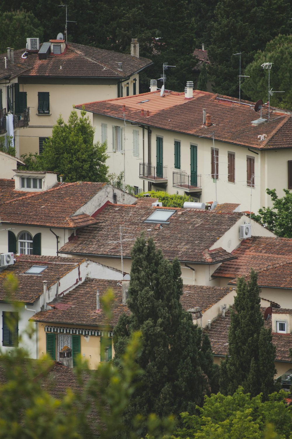 top view of white houses with brown roofs