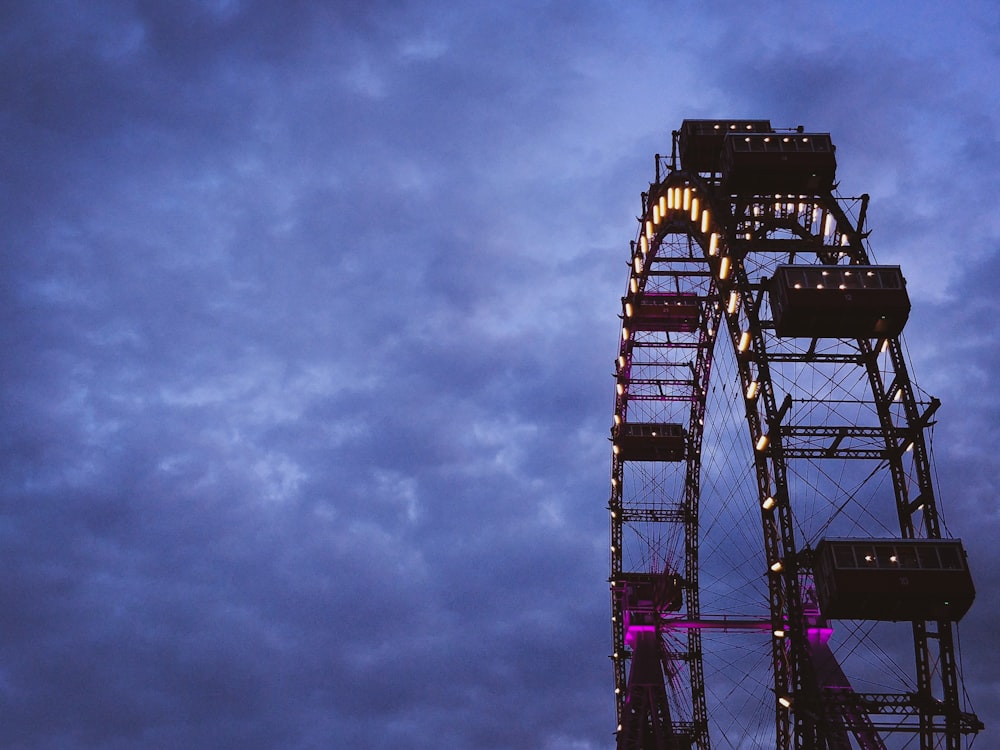 black ferries wheel under gray skies