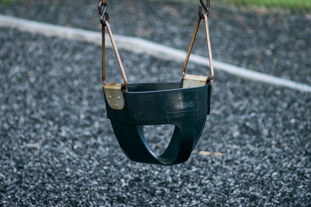 black plastic wearable hanging chair