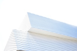 white concrete building depicting website design