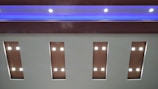 A modern false ceiling with subtle lighting creating an inviting ambiance.