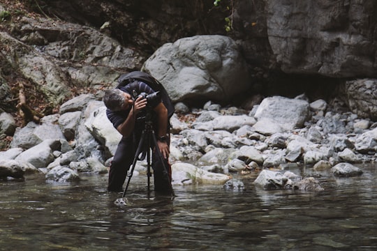 man holding DSLR camera in Lagodekhi Georgia