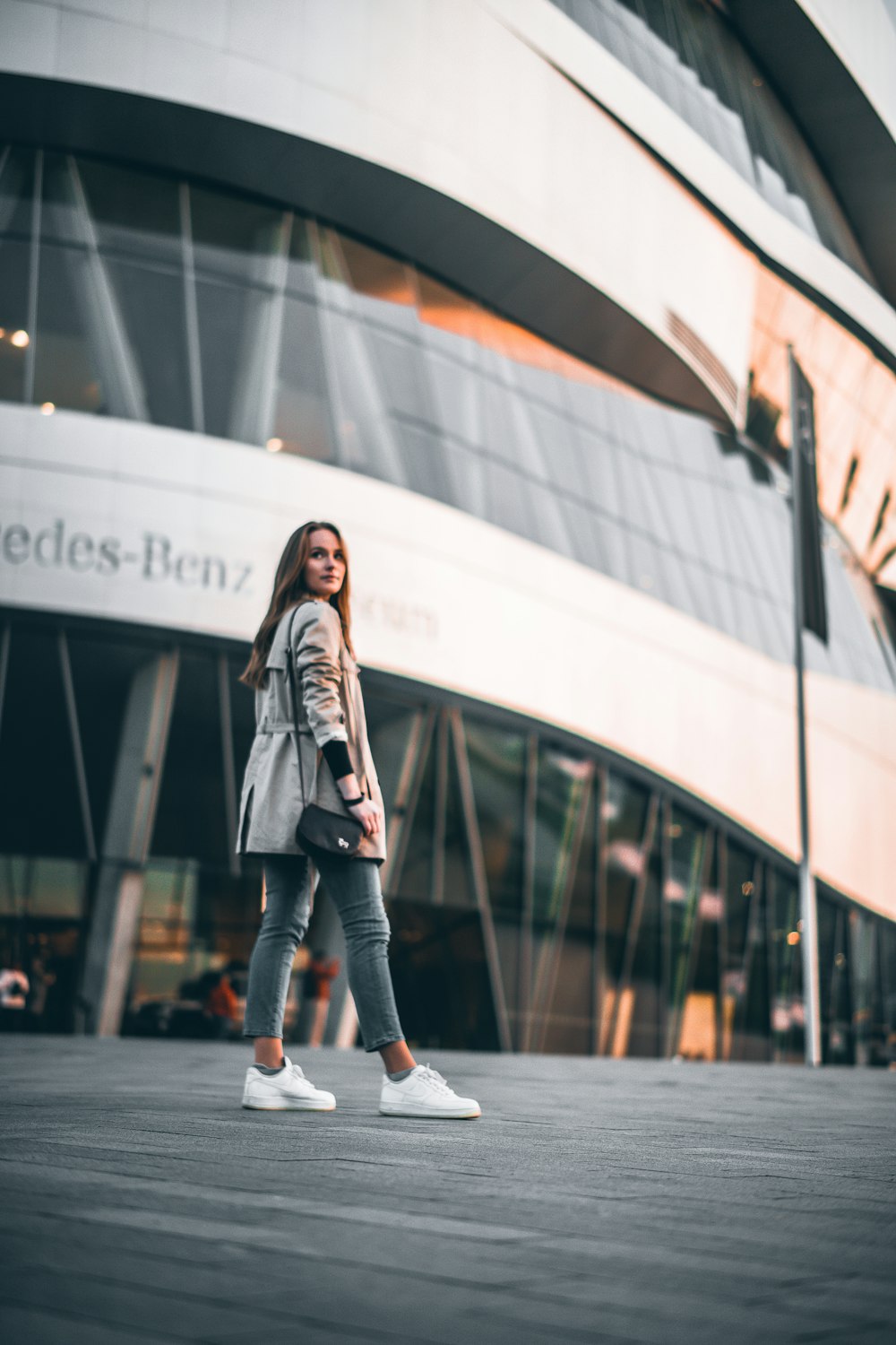 woman wearing gray jacket