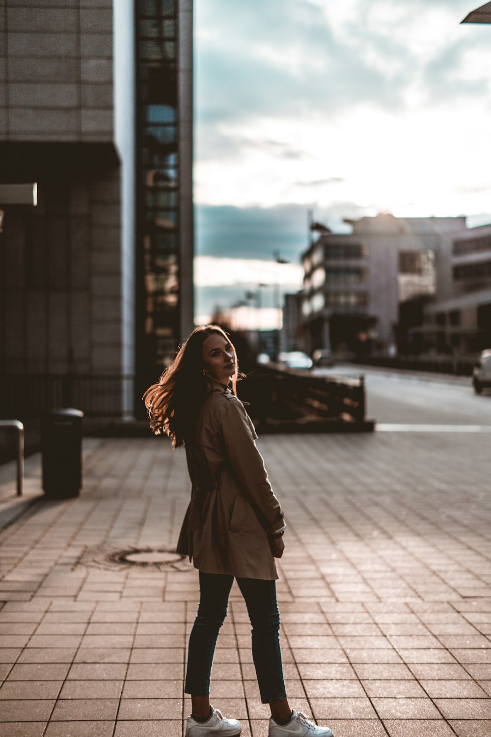 woman in brown coat