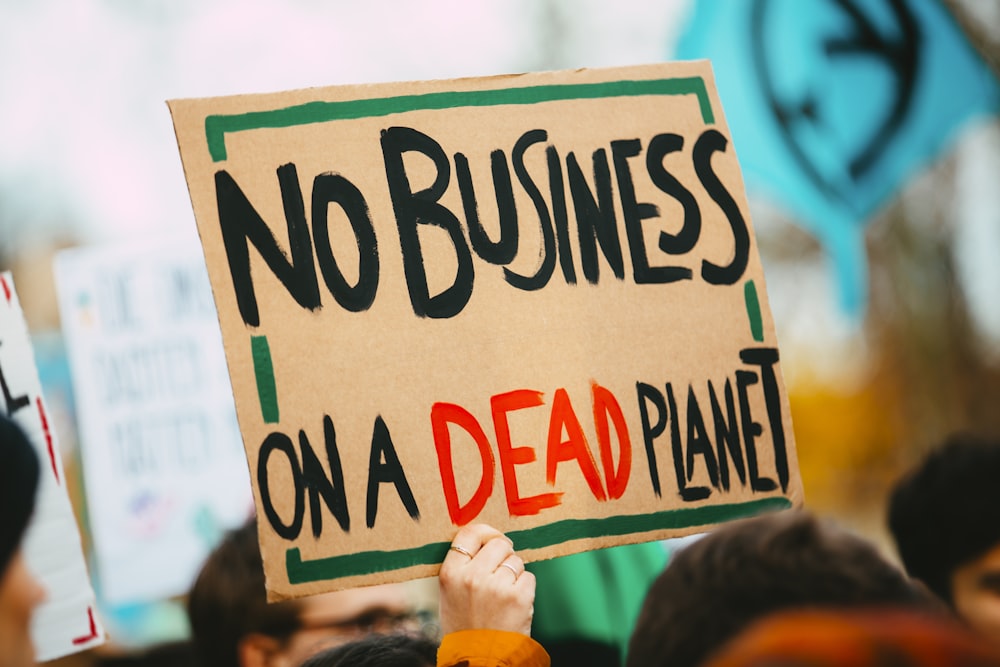 no business on a dead planet sign