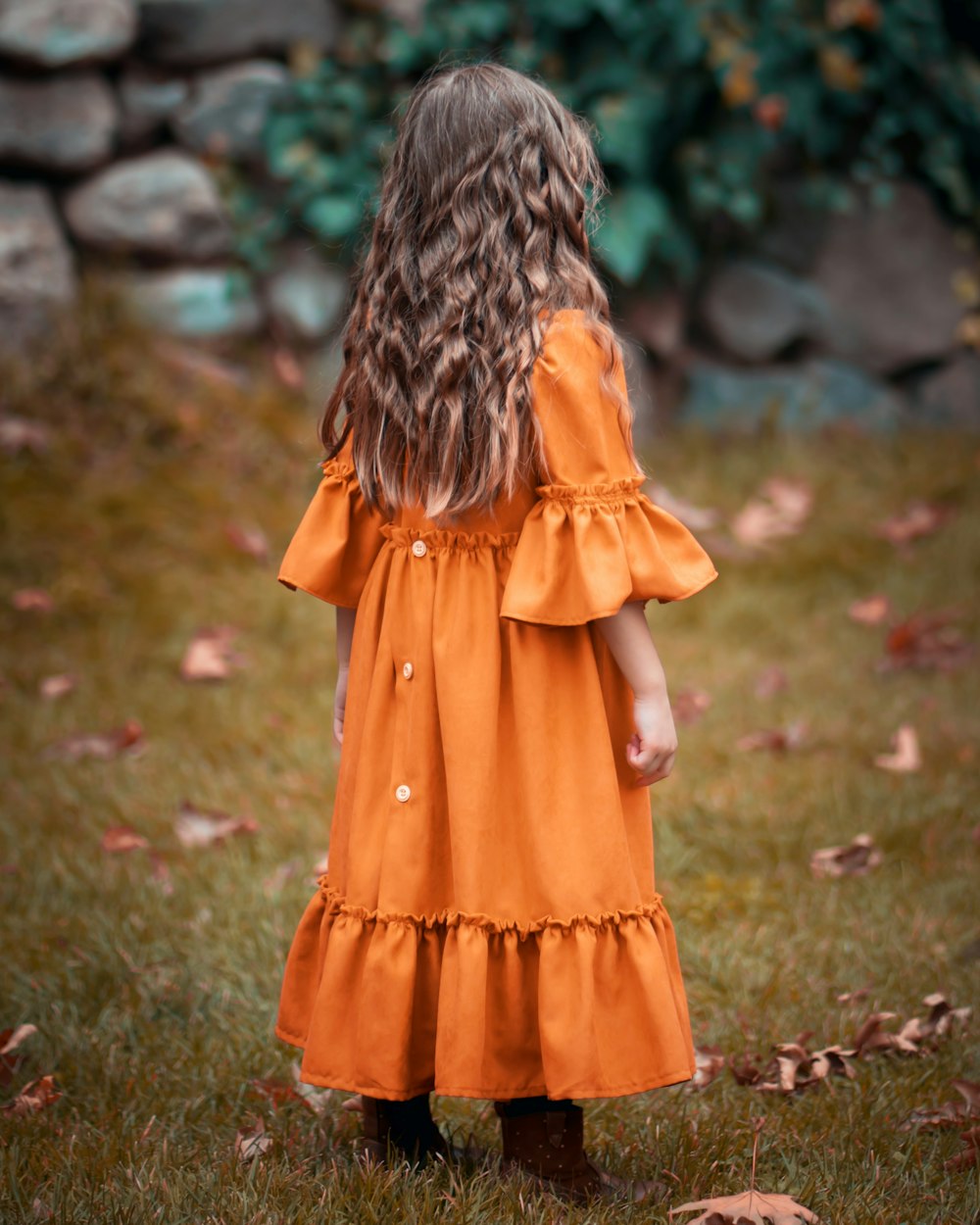 girl wearing orange dress