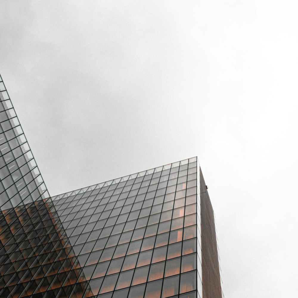 a very tall building with a clock on it's side