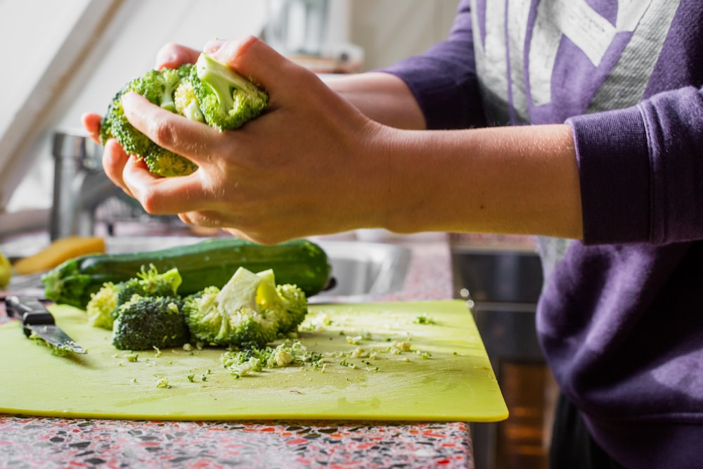 person holding vegetable