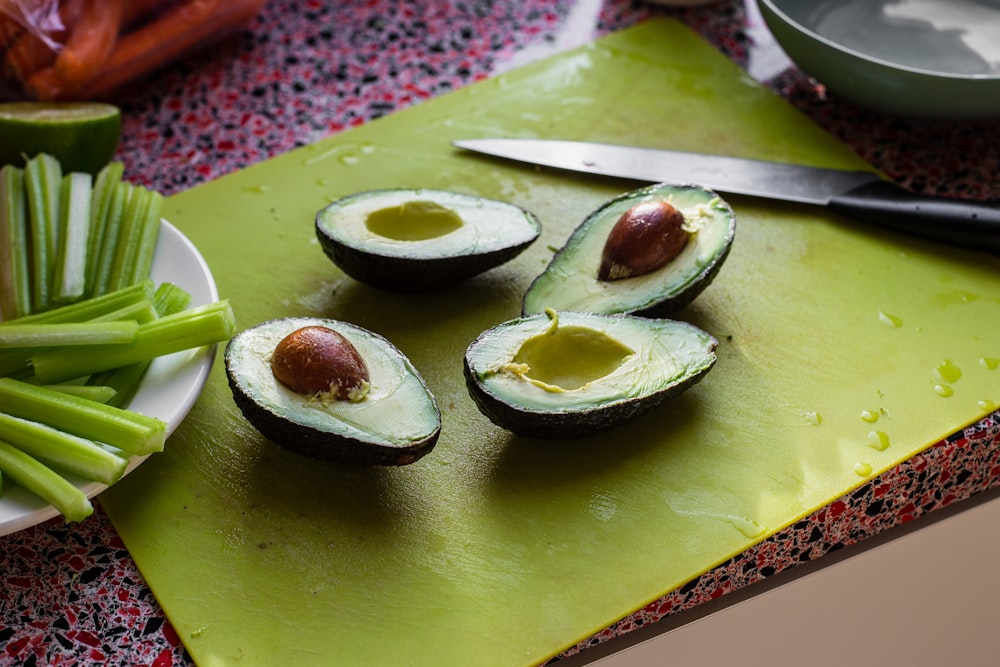 sliced avocados on tray
