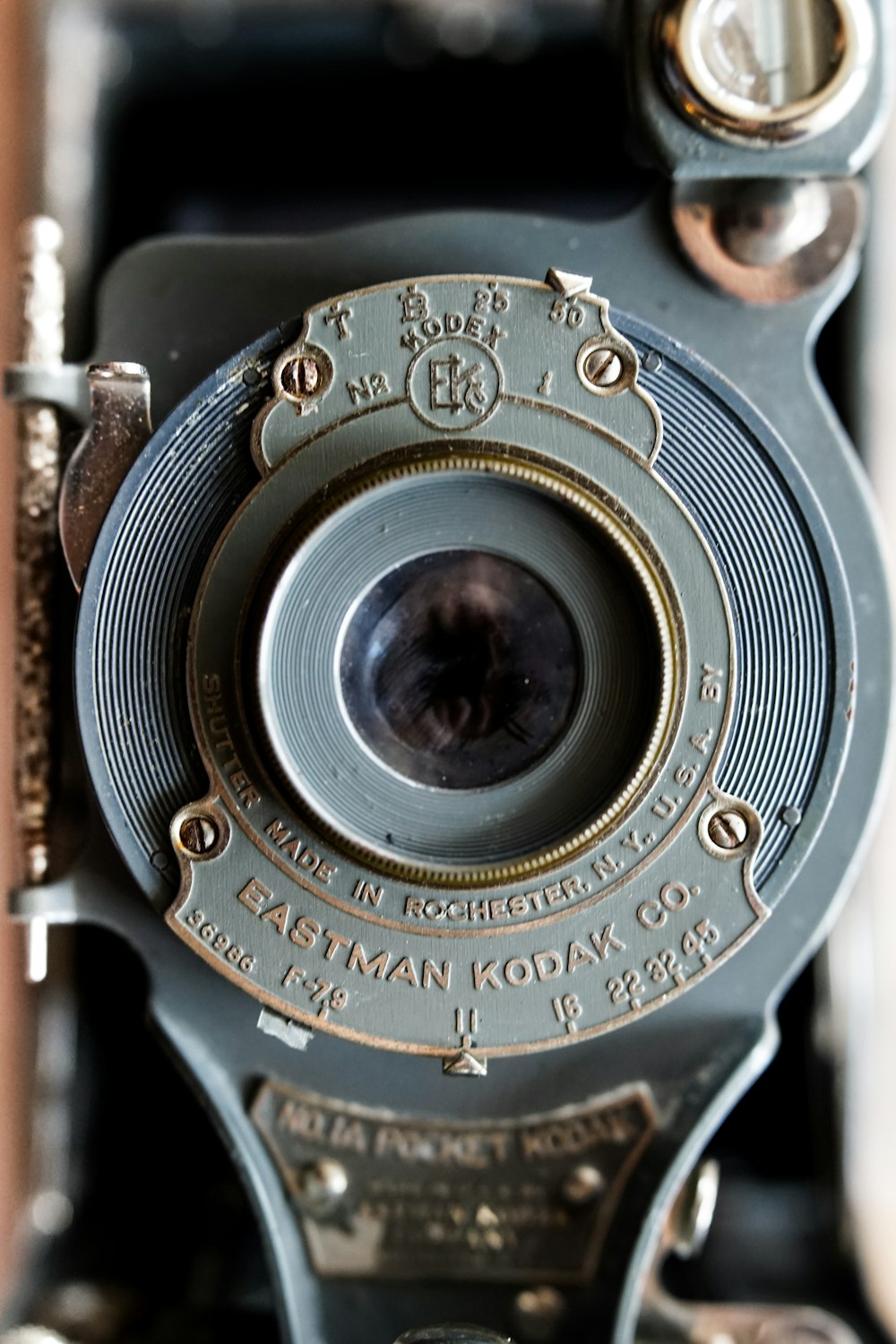 a close up of an old fashioned camera