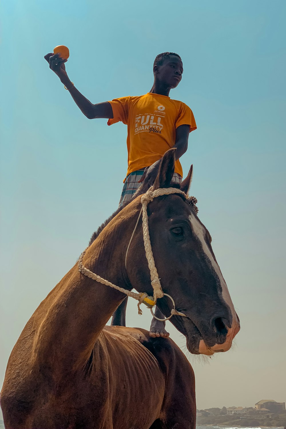 man standing on the horse
