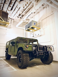 green SUV in garage