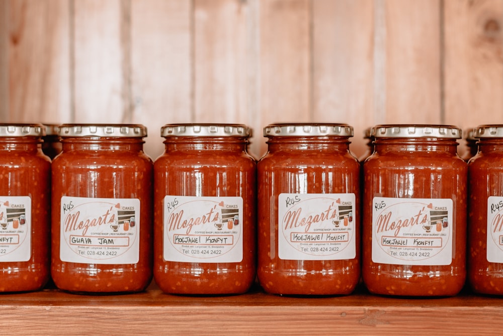 sauce in clear glass jar with lid on display