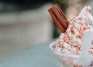 ice cream with sprinkles and chocolate on top