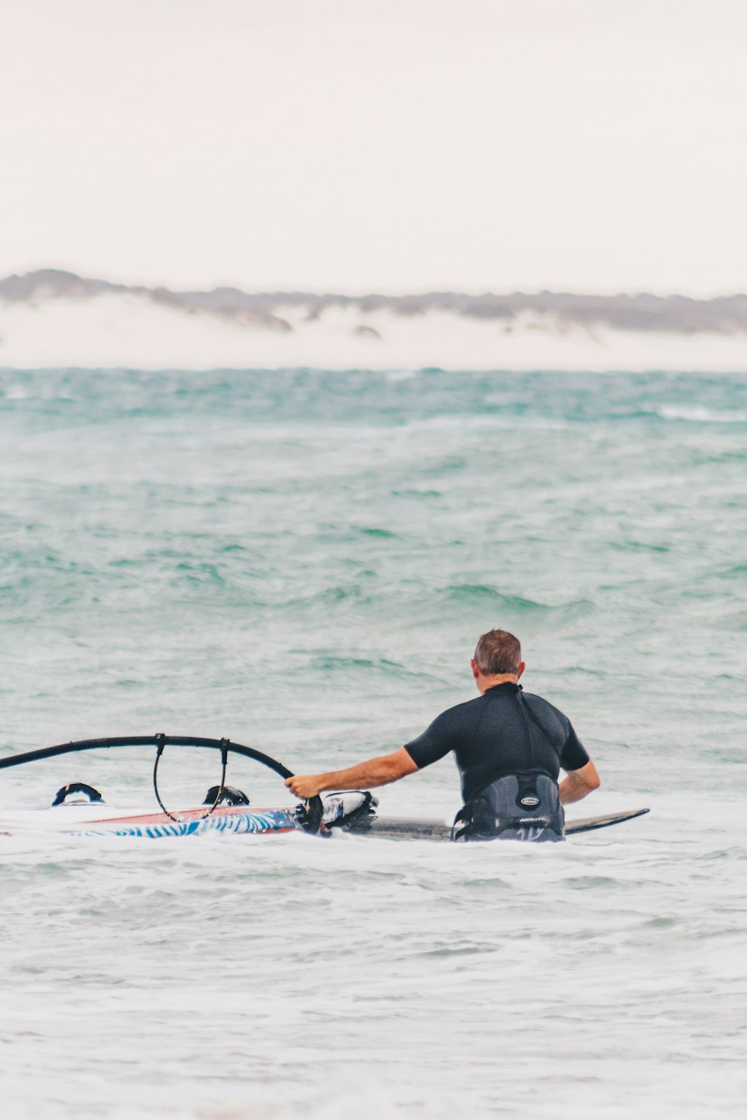 man on the body of water photograph