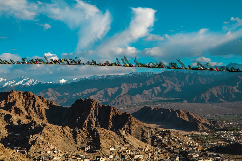 view of building by mountains at daytime