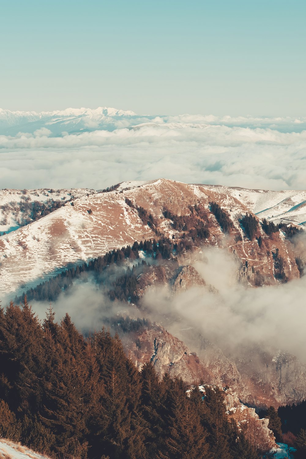 mountains under cloudy sky