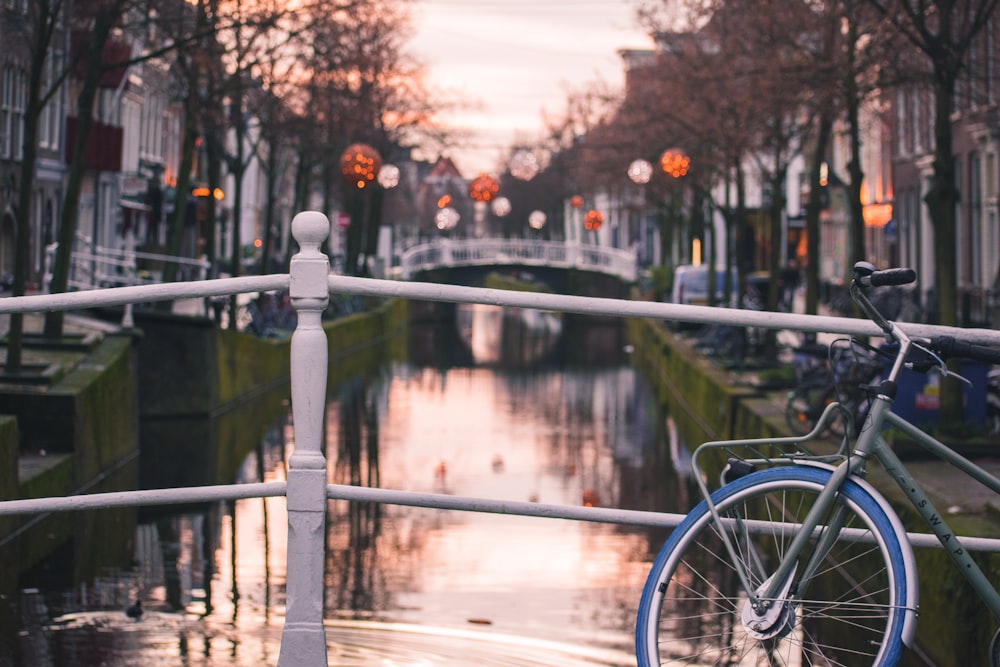 parked bike beside railing