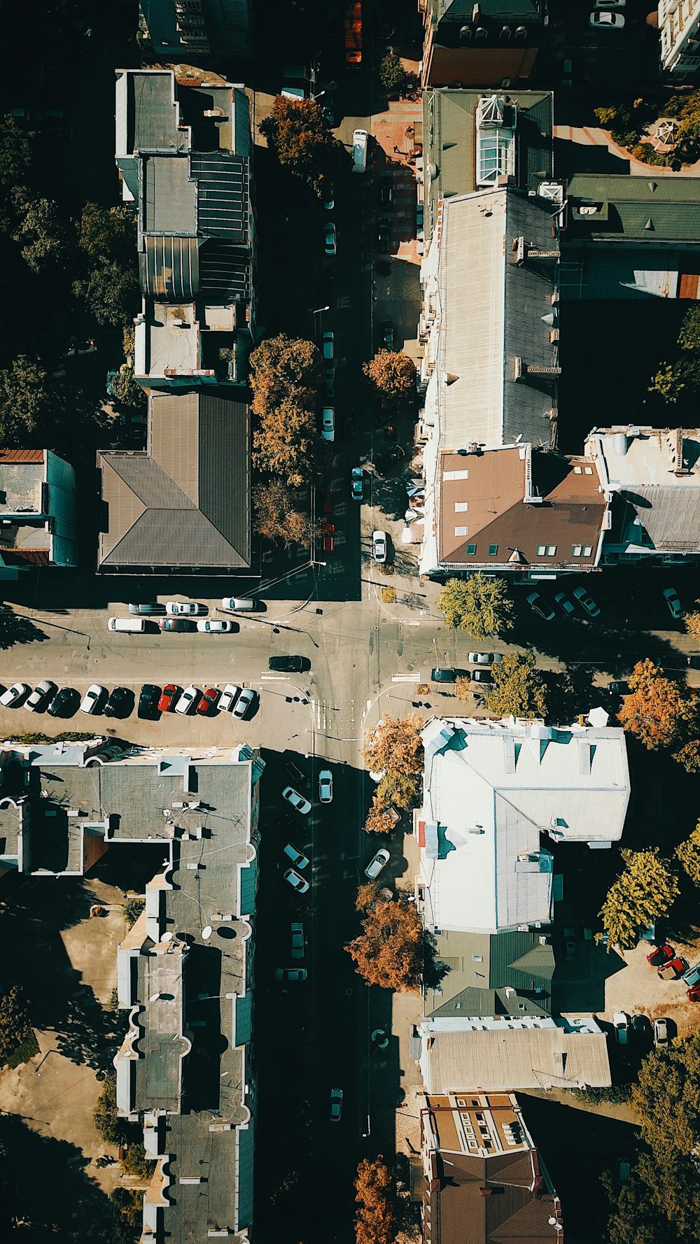 an aerial view of a city with lots of houses