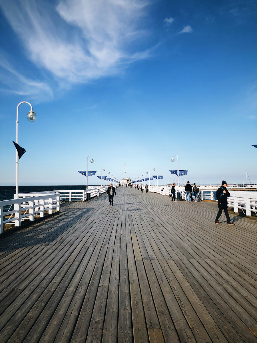 Visitors walking along Sopot Pier