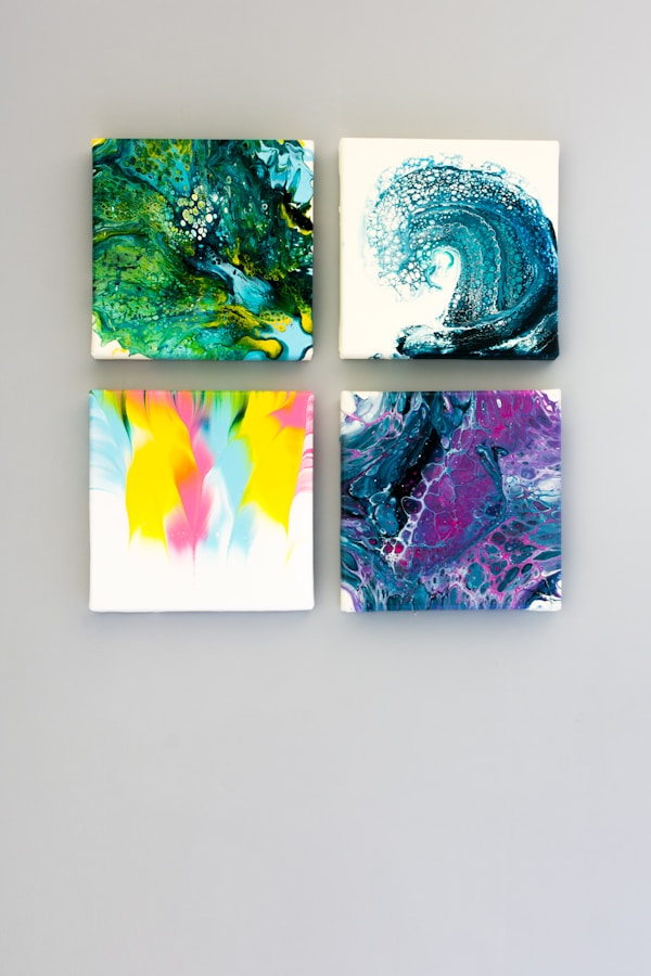 multicolored abstract 4-panel painting set on white surfaceby Z S
