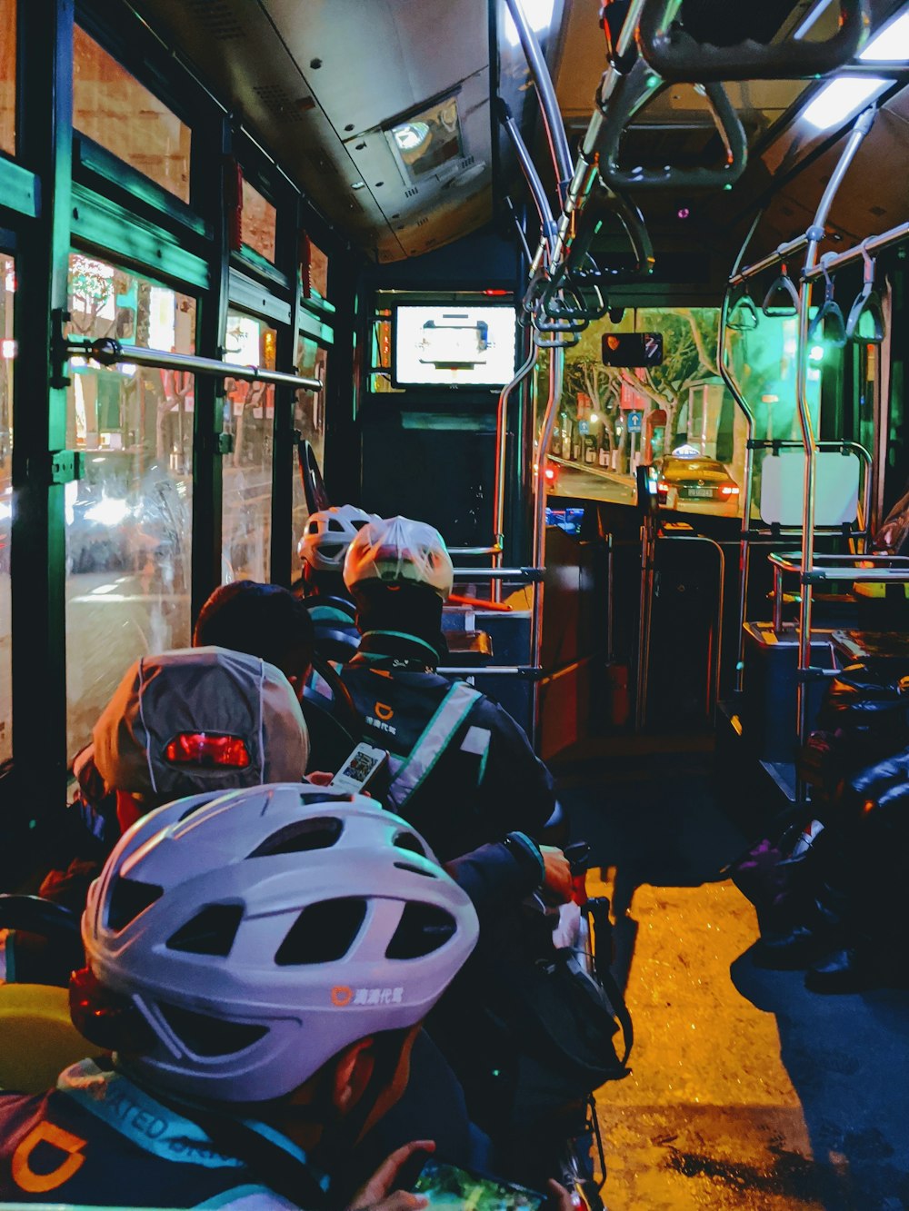 people wearing bike helmets