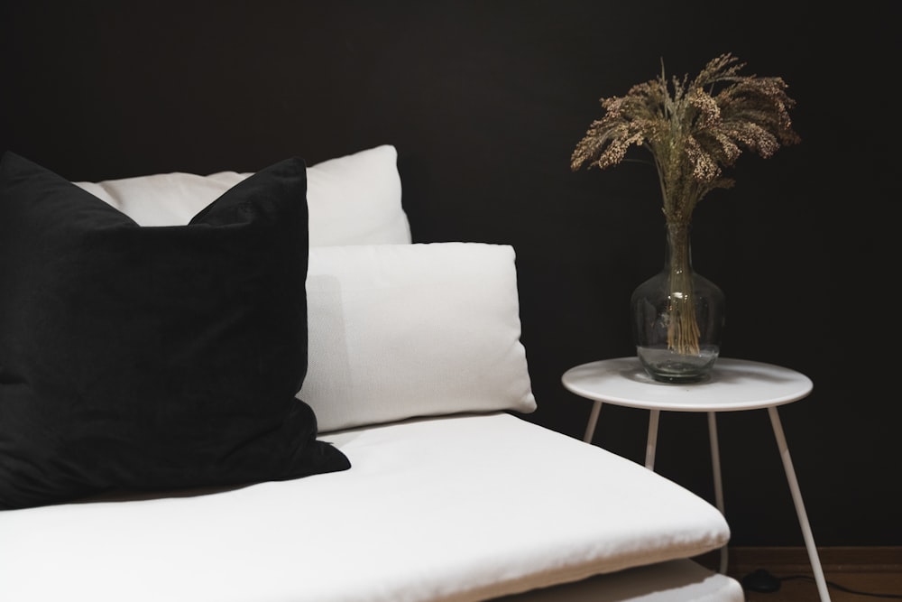 black pillow on white sofa