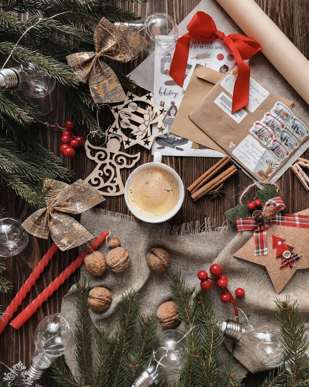 flatlay photography of mug beside envelopes