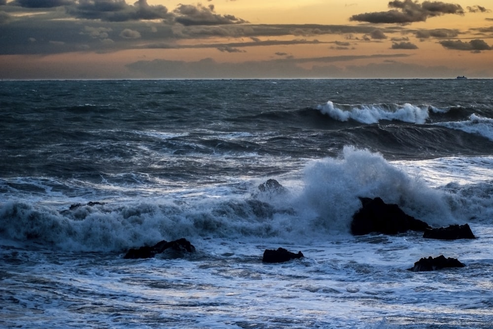 waves crashing on rocks