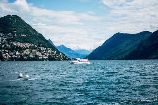 passenger boat on water in Monte Brè Switzerland