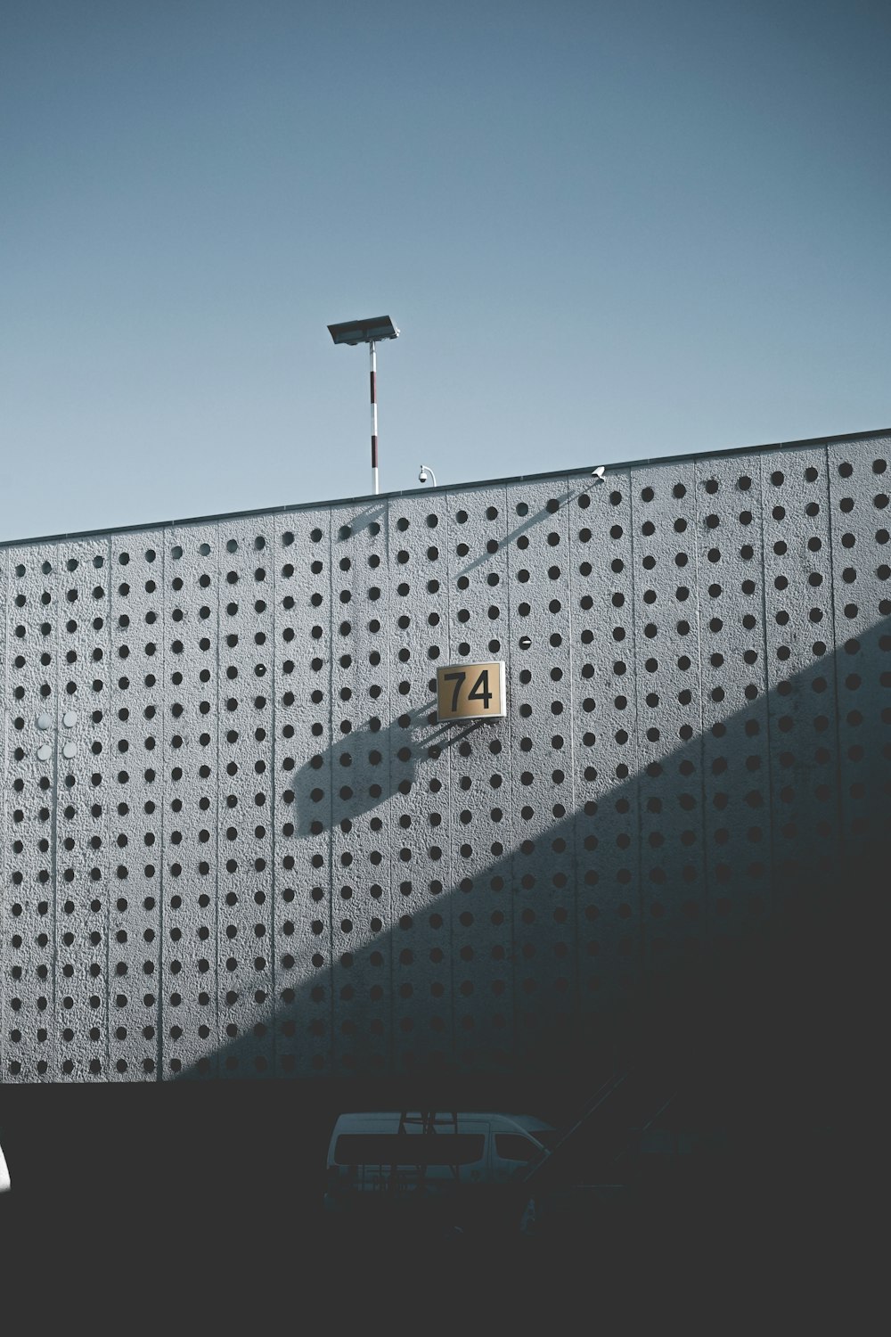 low angle photography of gray building structure