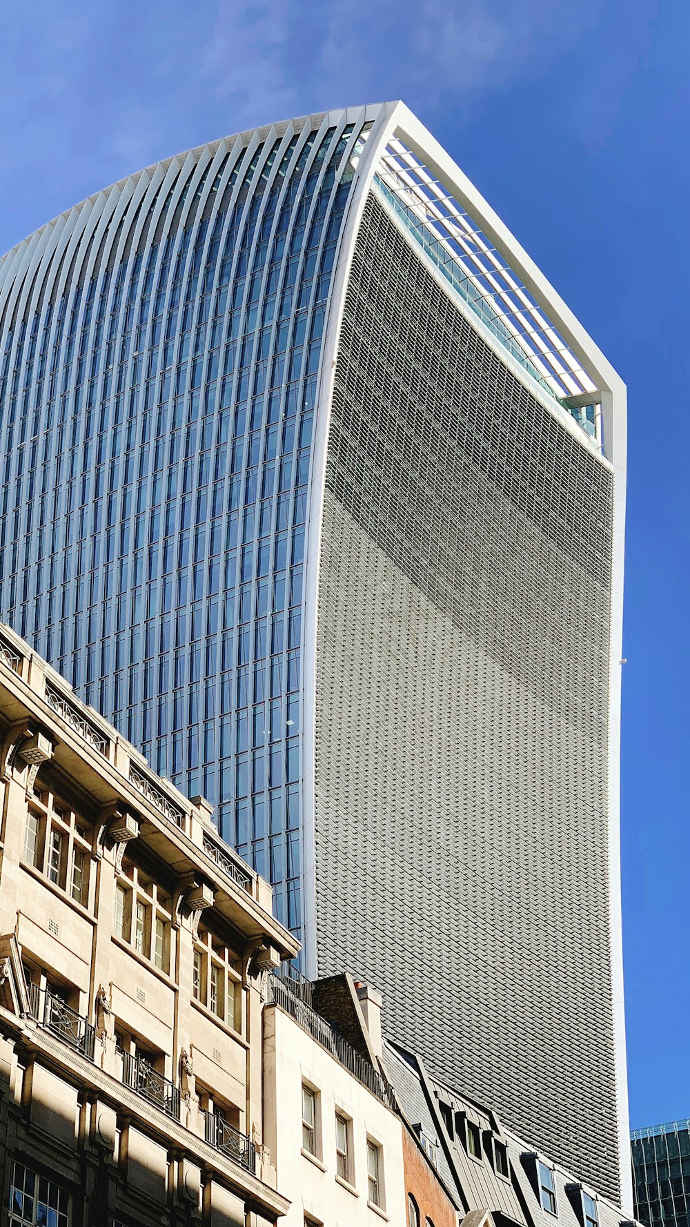 concrete building with glass curtain