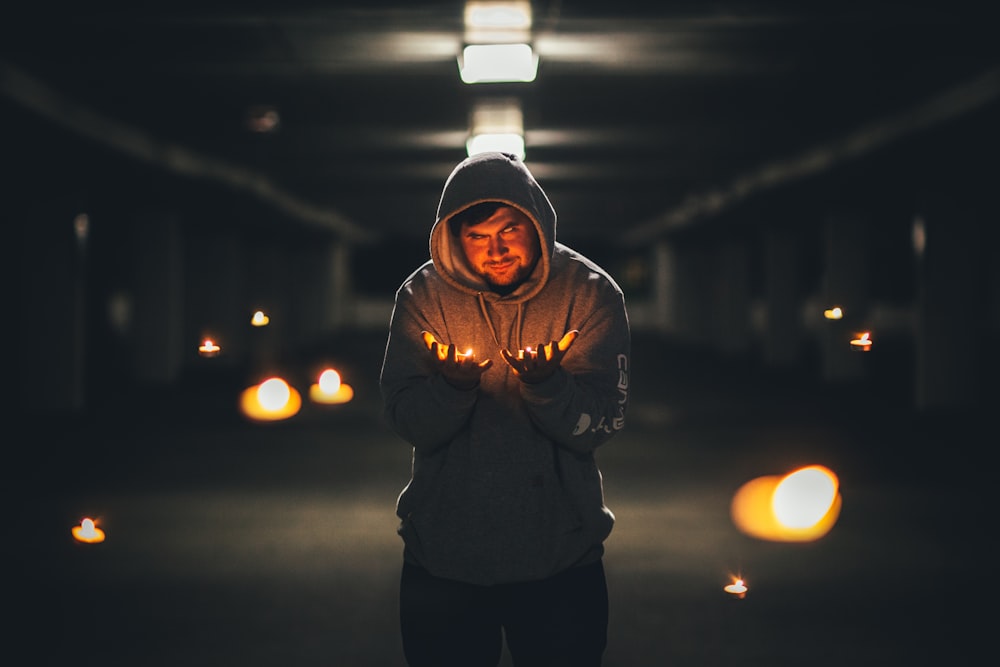 man wearing grey pullover hoodie