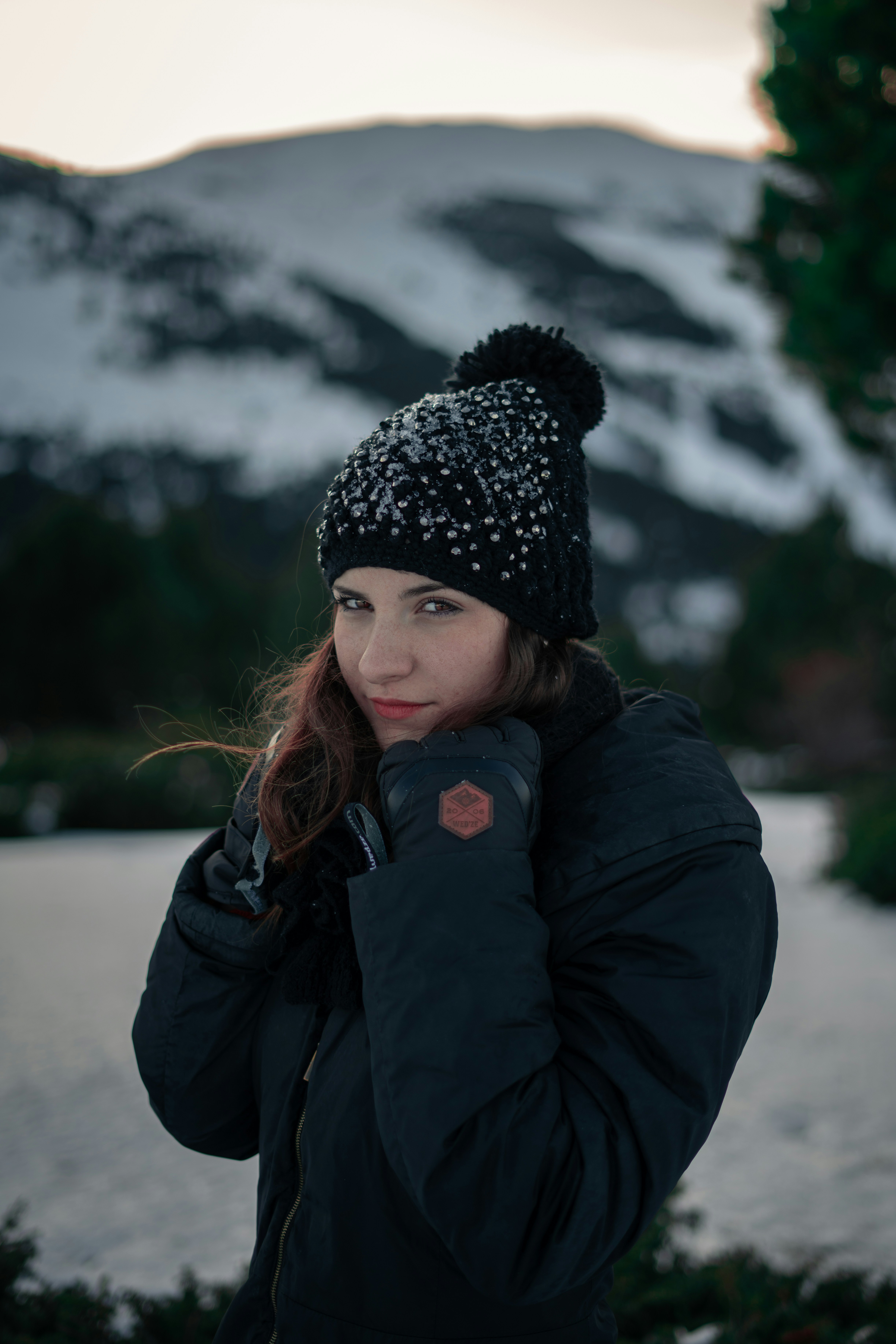 woman holding her hair