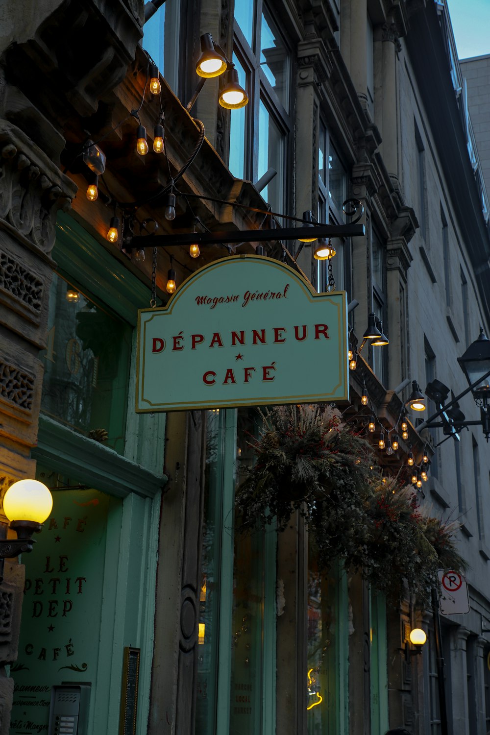 shallow focus photo of depnneur cafe sigange