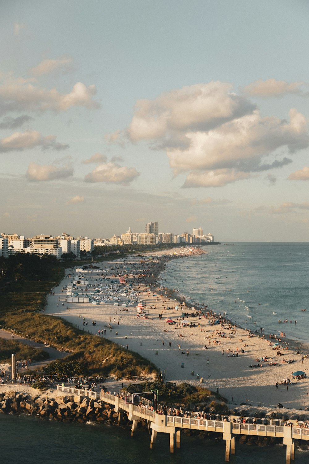 bird's eye photography of city near shoreline and body of water