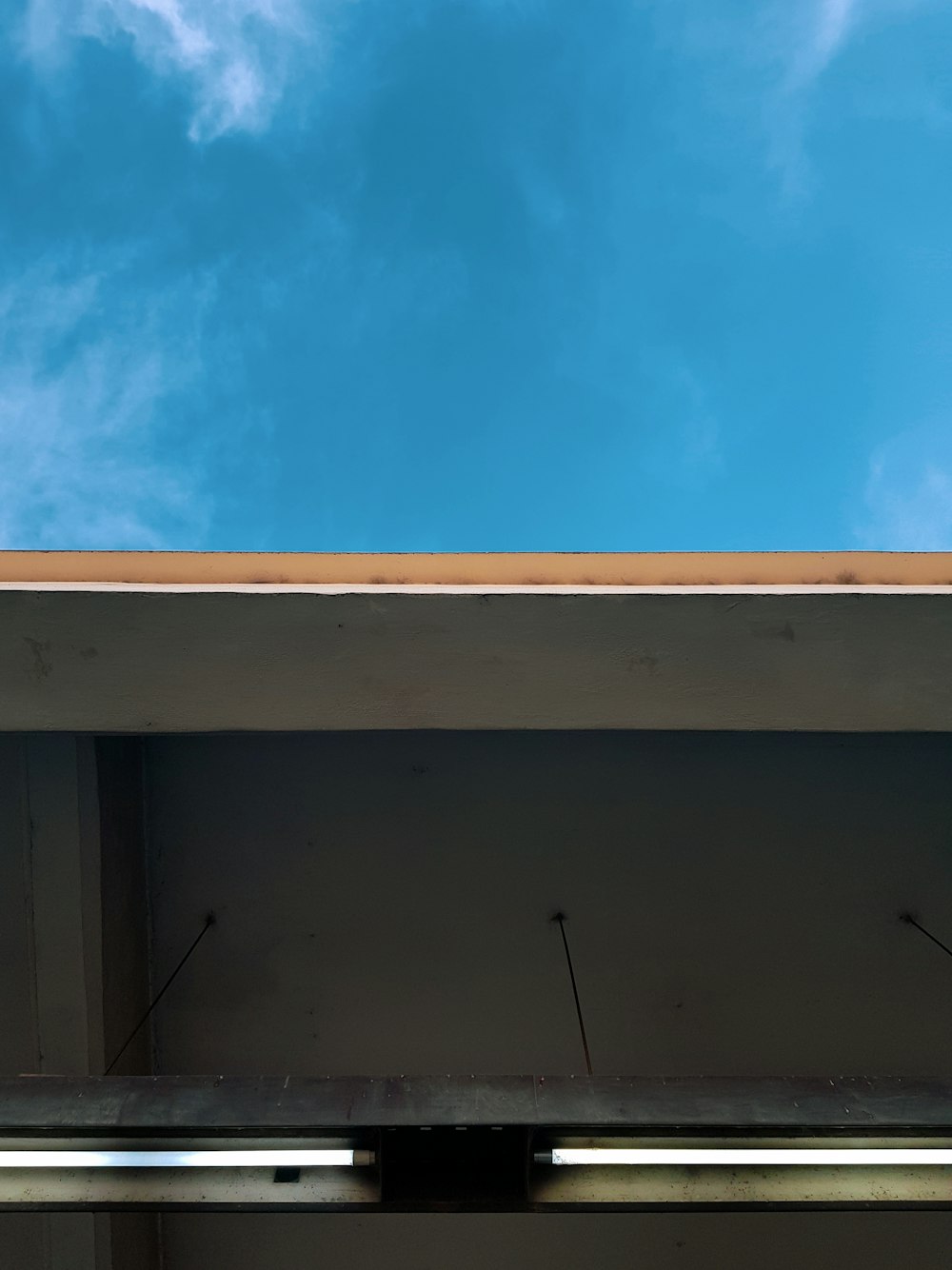 a building with a sky in the background