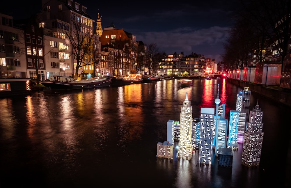 a river that has some buildings on it