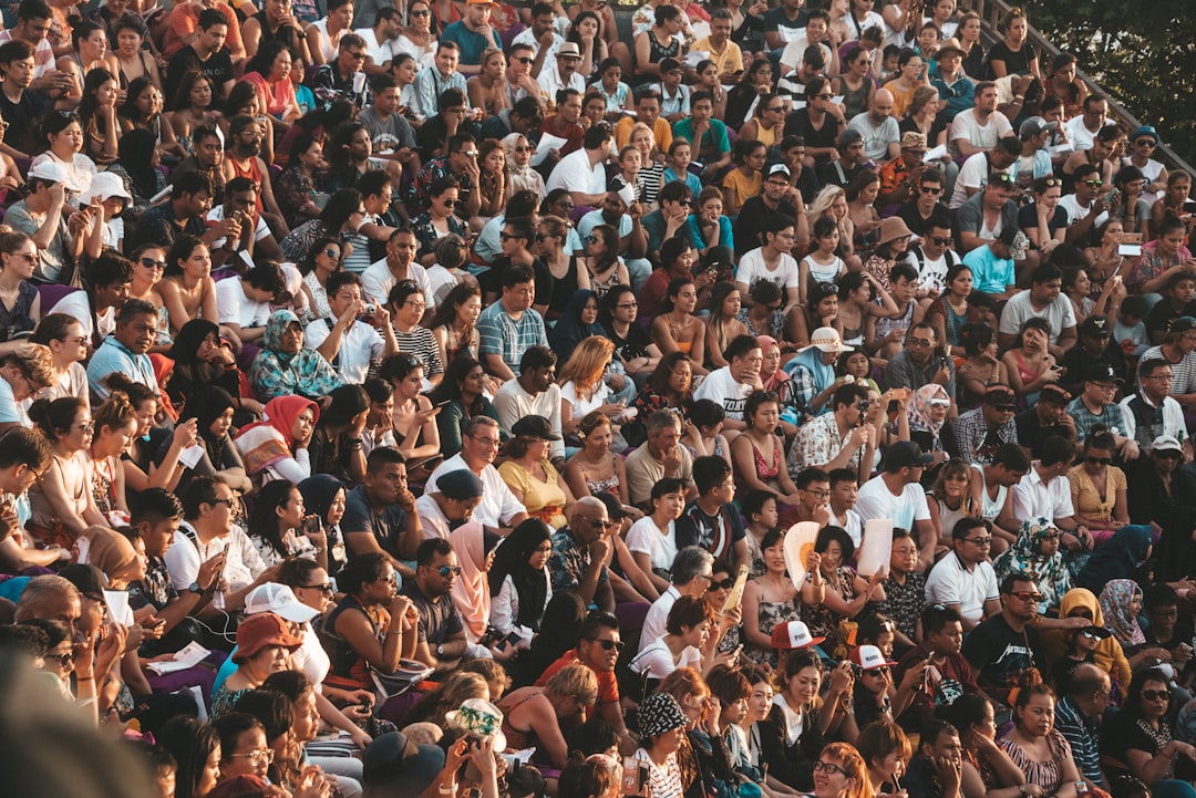 people sitting on stand