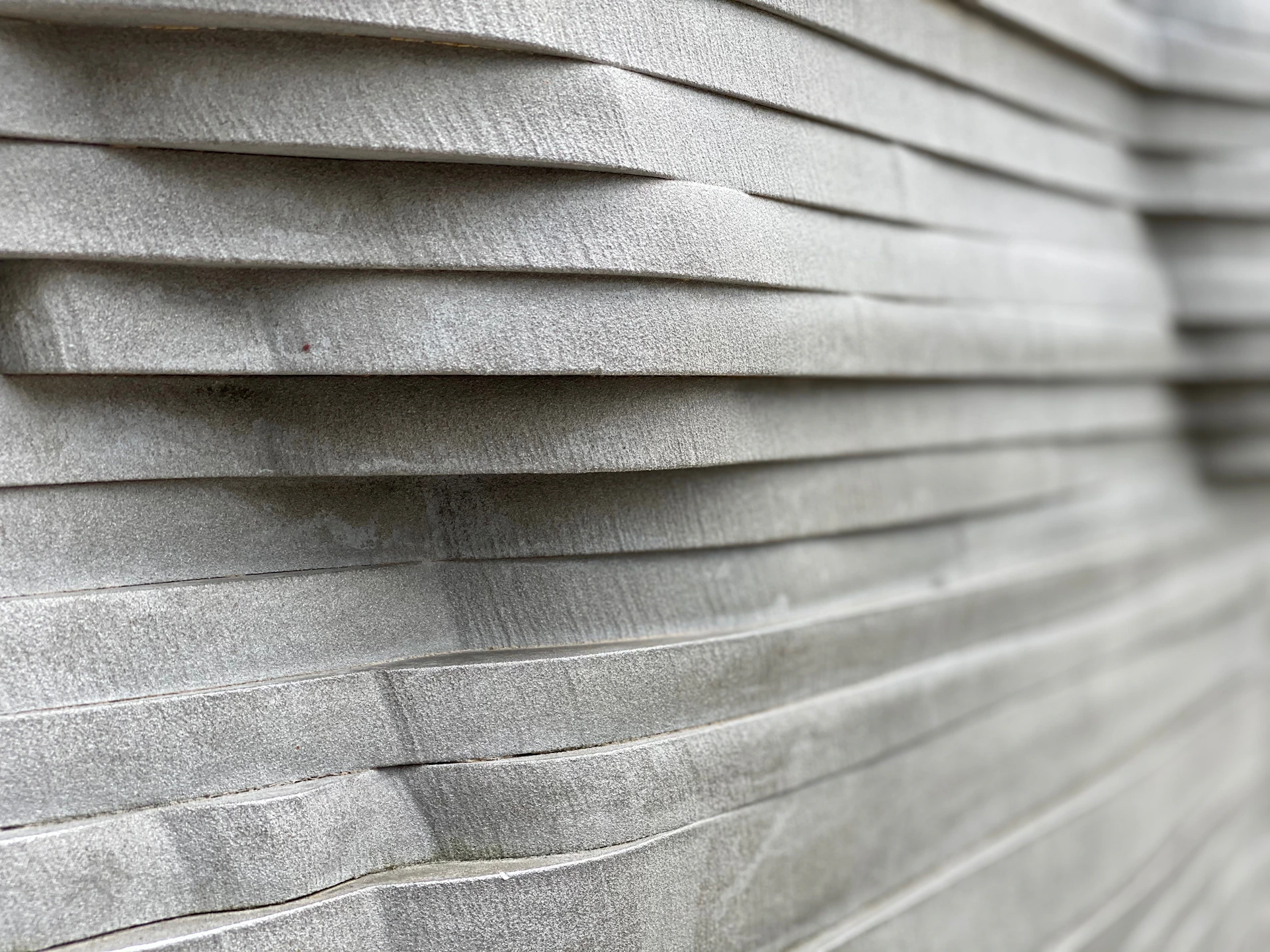 a close up of a wall made of concrete blocks