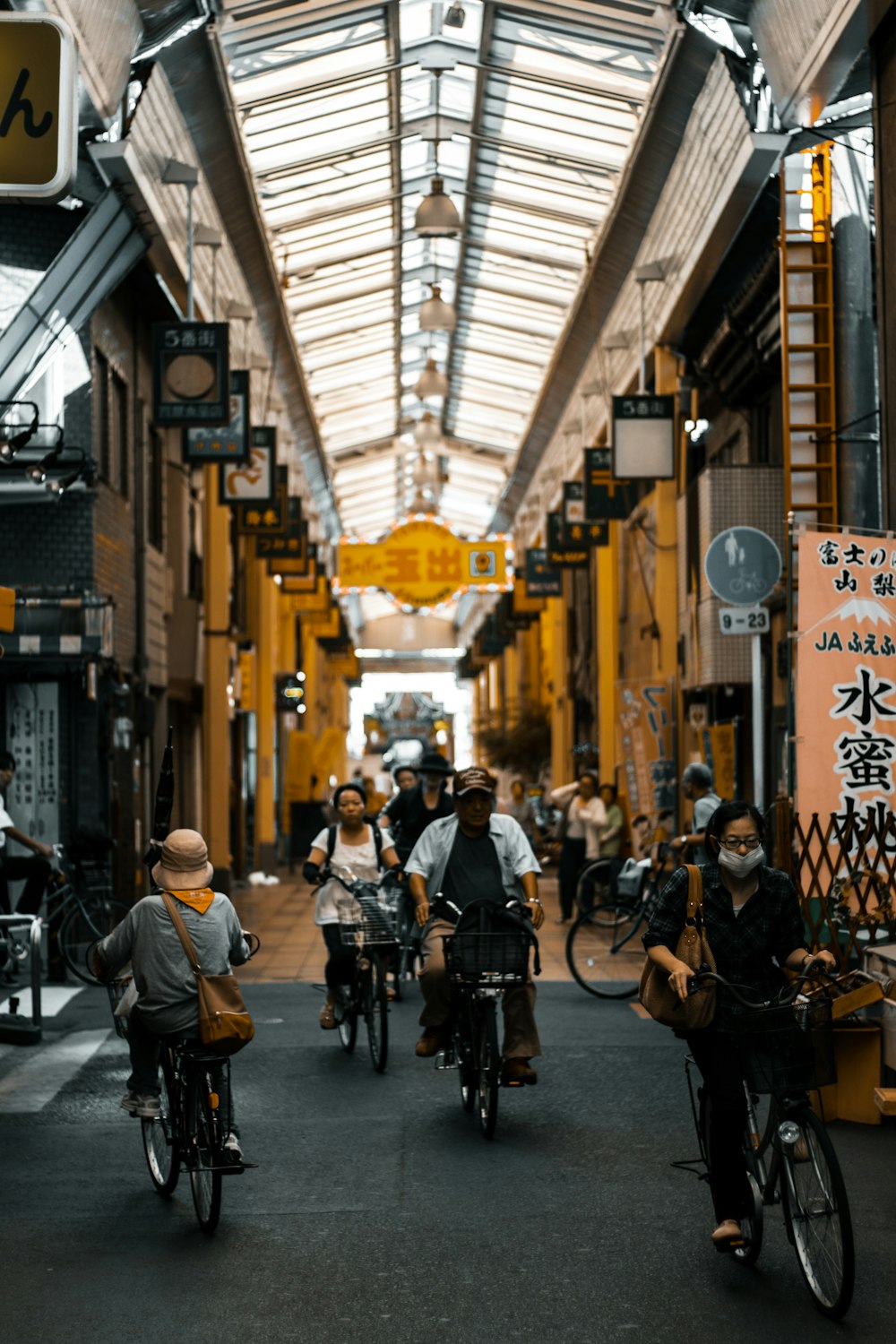 people riding bicycle on street