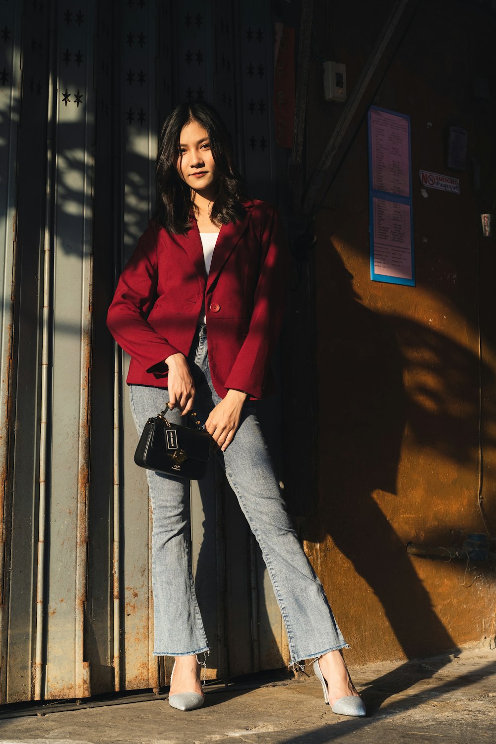 woman leaning on scissor doors