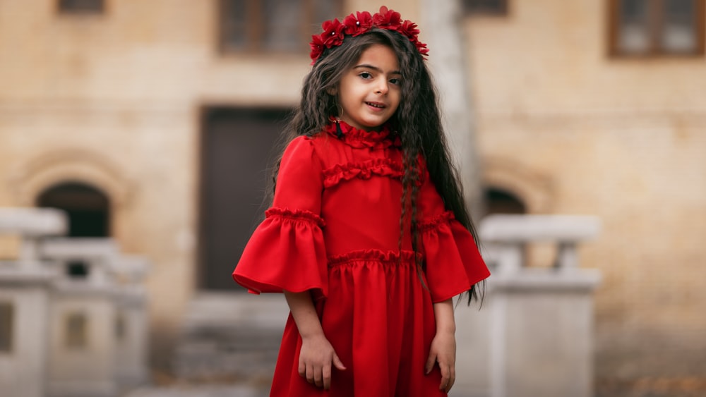 girl standing near building