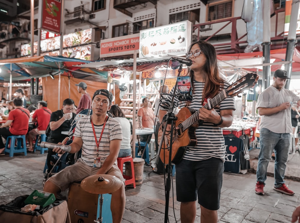 two person playing on street