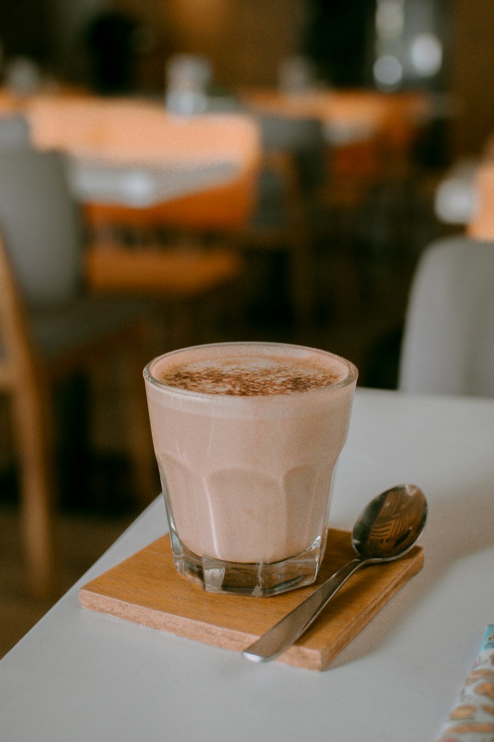 clear glass cup on brown slab