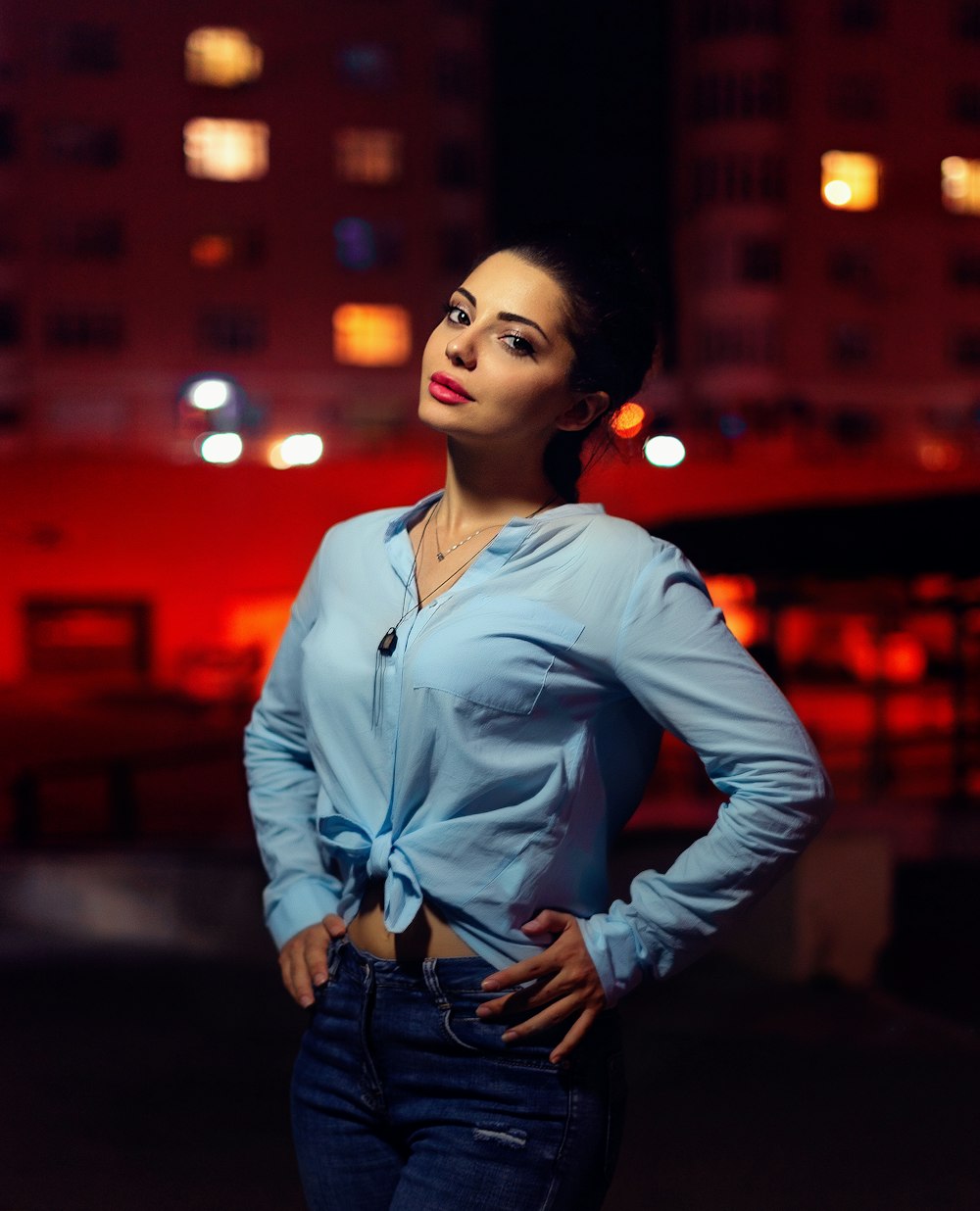 woman standing near building