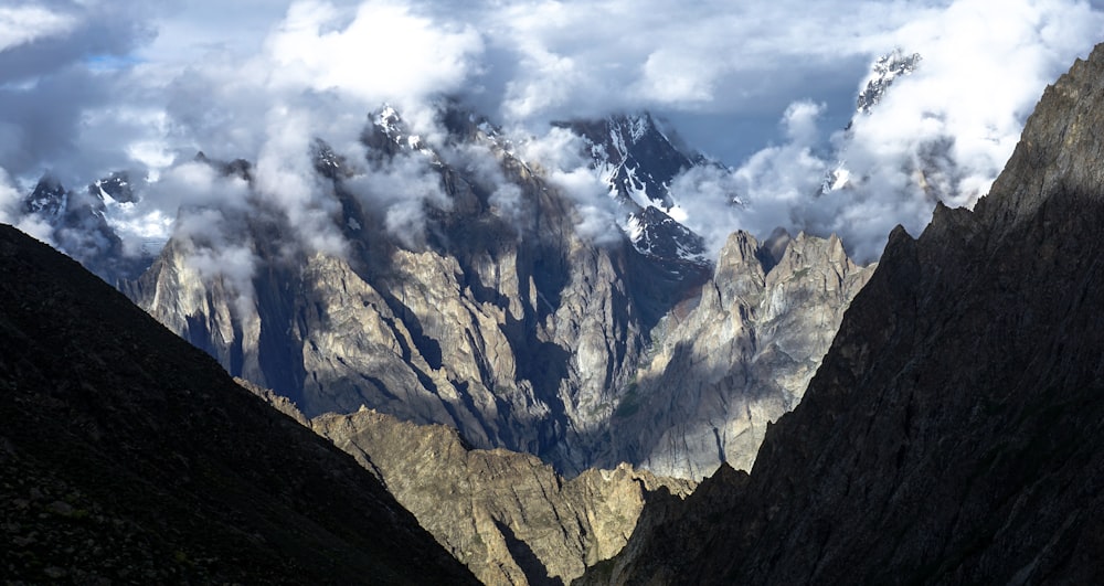 mountains under a cloudy sky